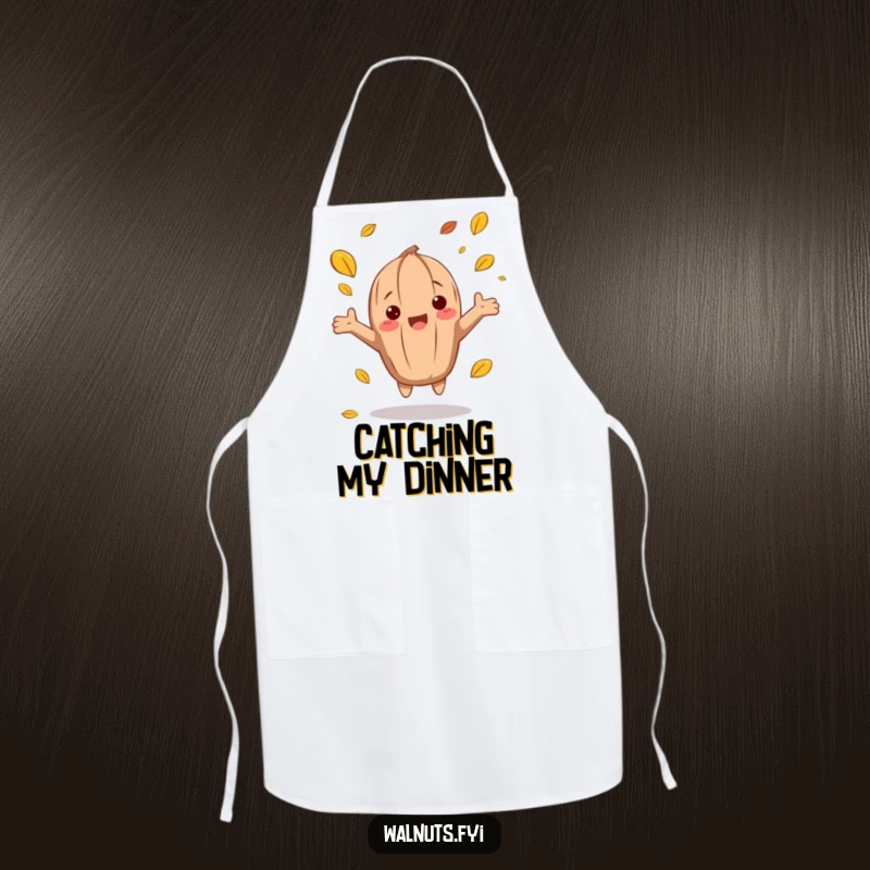 Durable funny autumn walnut apron showing a character catching falling leaves, ideal for seasonal cooking.