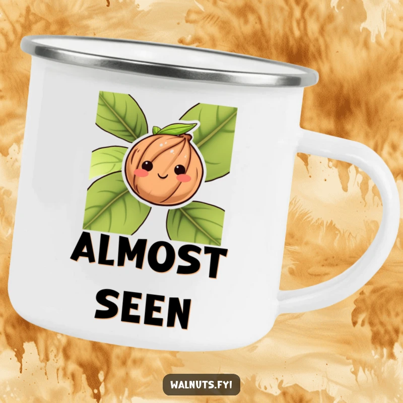 Funny camping mug featuring a shy walnut peeking from behind a leaf, perfect for cozy outdoor moments.