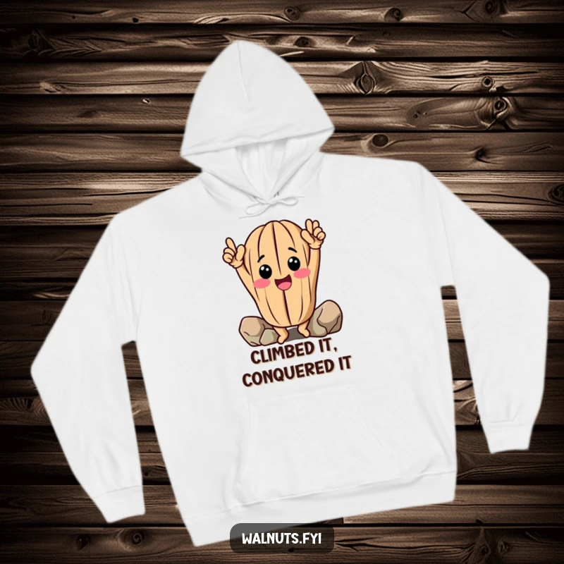 Funny Walnut Hoodie: Cheerful anthropomorphic walnut celebrates climbing success with raised arms, soft and humorous.