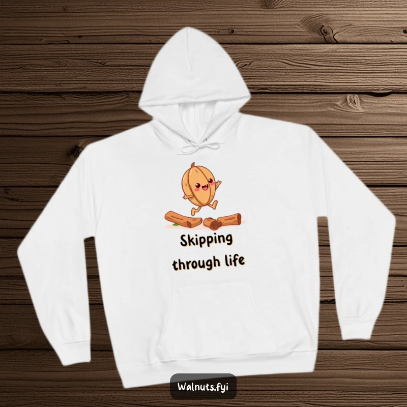 Funny hoodie design featuring a joyful walnut skipping with abandon on a pathway made of cinnamon sticks.