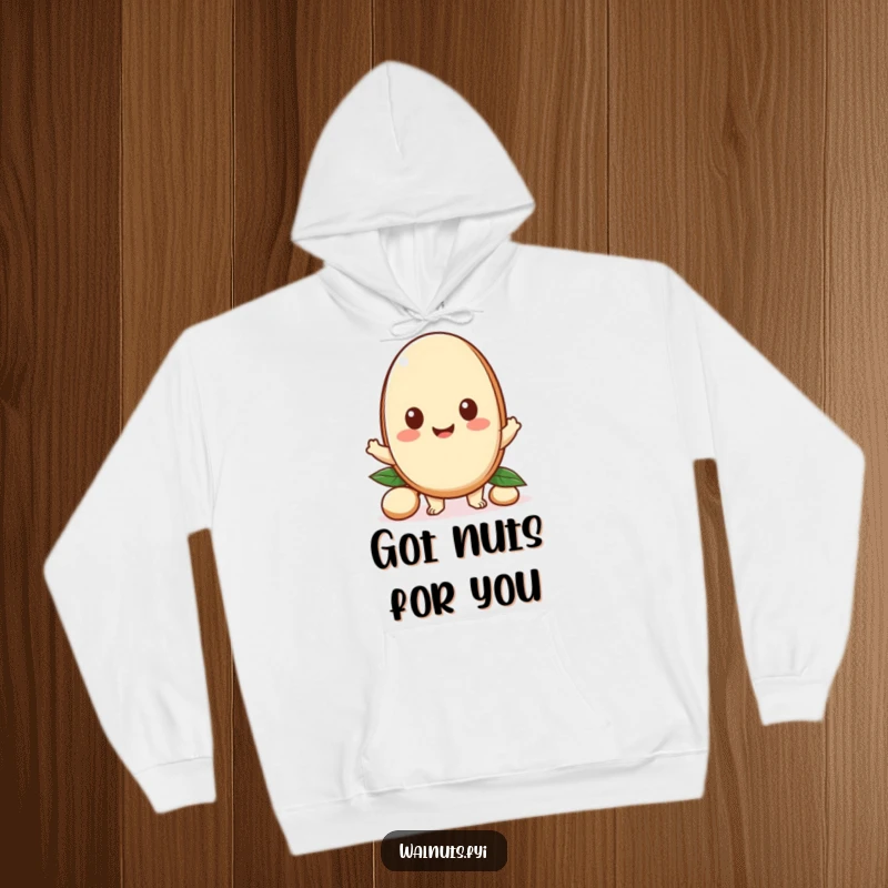 Funny hoodie featuring a happy Kawaii macadamia nut character offering a piece, symbolizing cozy generosity and sharing.