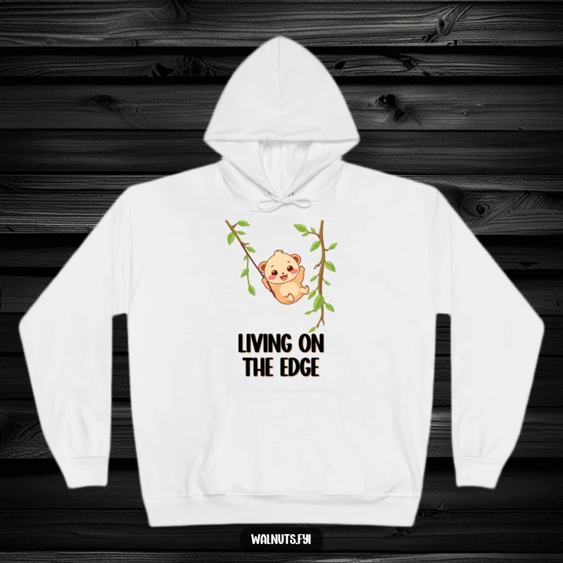 Funny, wobbly beige hazelnut with a happy grin slides down a vine zipline on this cozy hoodie.