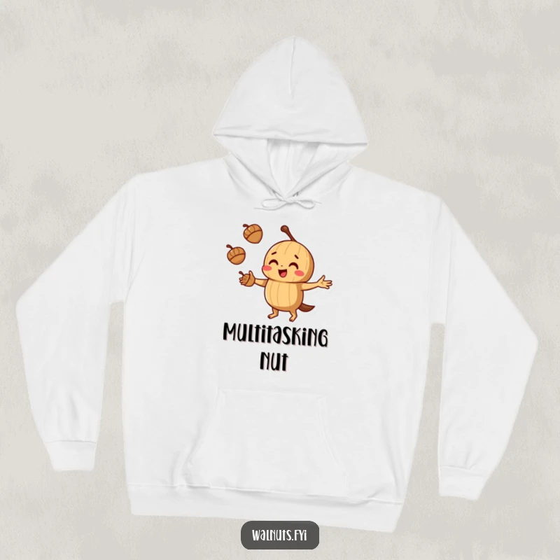 Comfortable funny juggling walnut hoodie showing a walnut juggling acorns with playful concentration, perfect for cozying up.