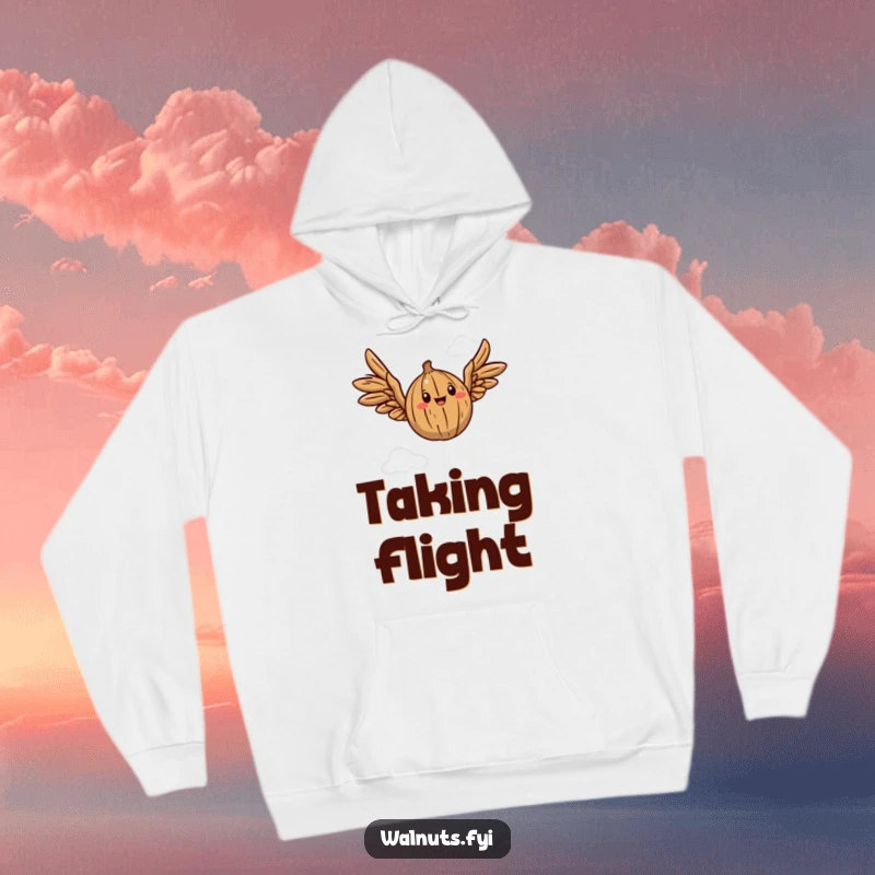 Funny hoodie featuring a walnut with outstretched wings, playfully flapping in the sky.