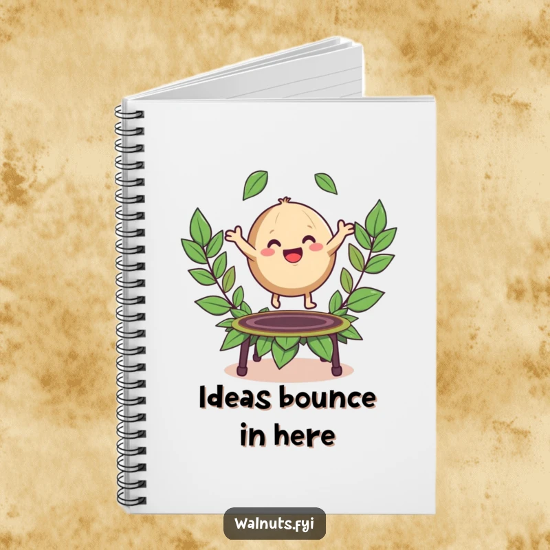 Funny notebook with a happy, round walnut character bouncing playfully on a trampoline made of leaves.