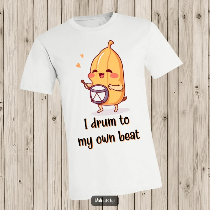 Funny T-shirt showcasing a joyful pecan enthusiastically drumming, capturing a moment of pure musical delight and guaranteed giggles.